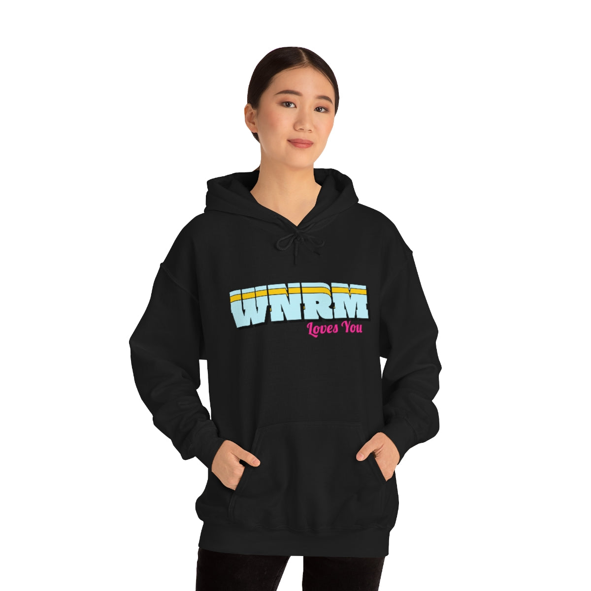 Girl wearing a WNRM Loves You Unisex Heavy Blend™ Hooded Sweatshirt, with a white background