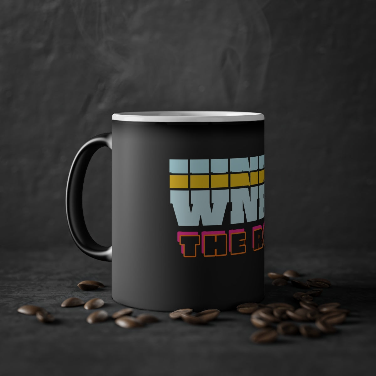 WNRM The Root Logo Magic Mug, 11oz, with coffee beans by the cup. with a black background