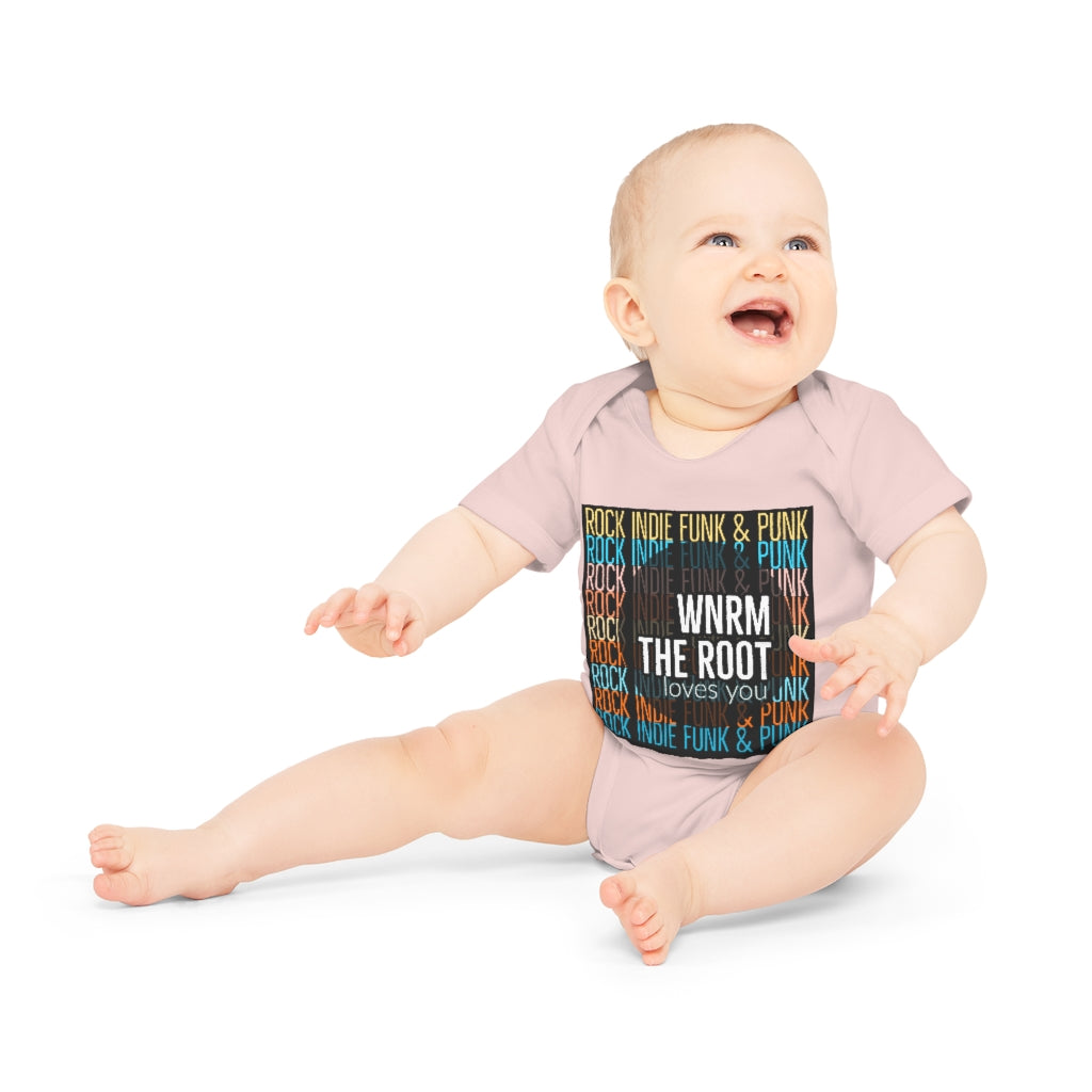 Cute baby wearing a WNRM The Root Loves You Colors bodysuit 