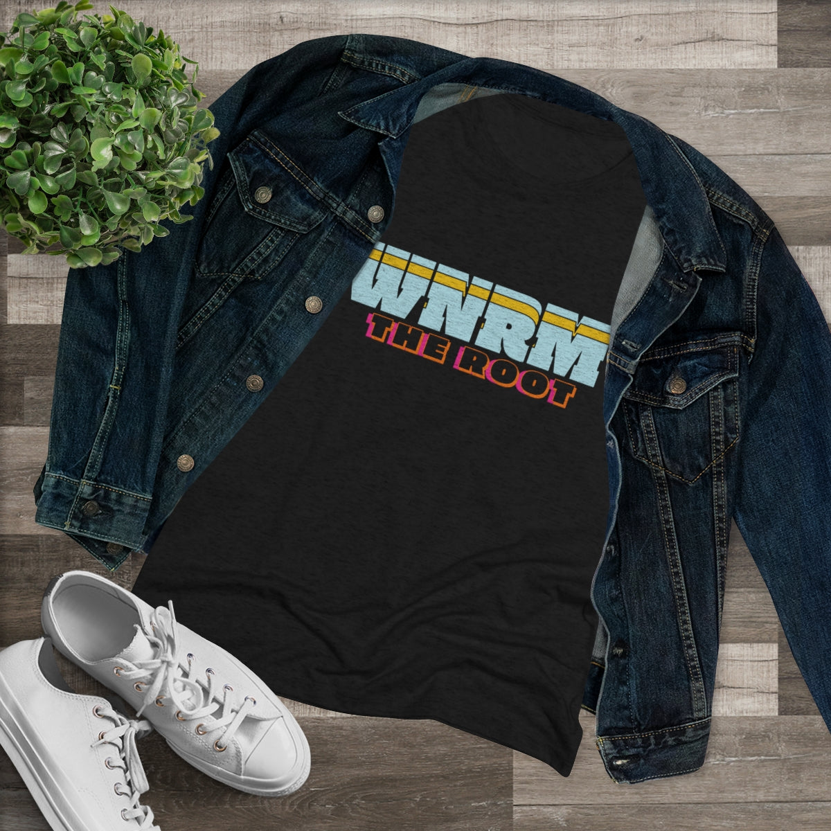 WNRM The Root Logo Tee Women's Triblend Tee, with jean jacket and white sneakers, and a plant