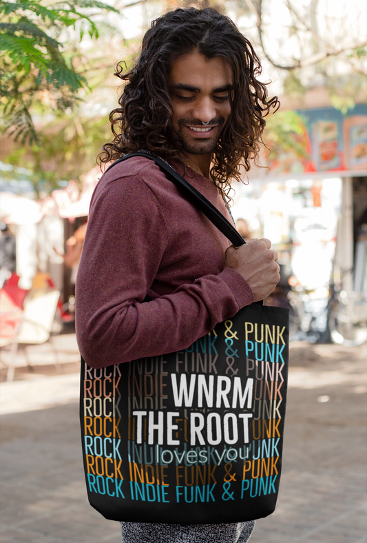 cool man with long hair carrying WNRM Loves You canvas bag 